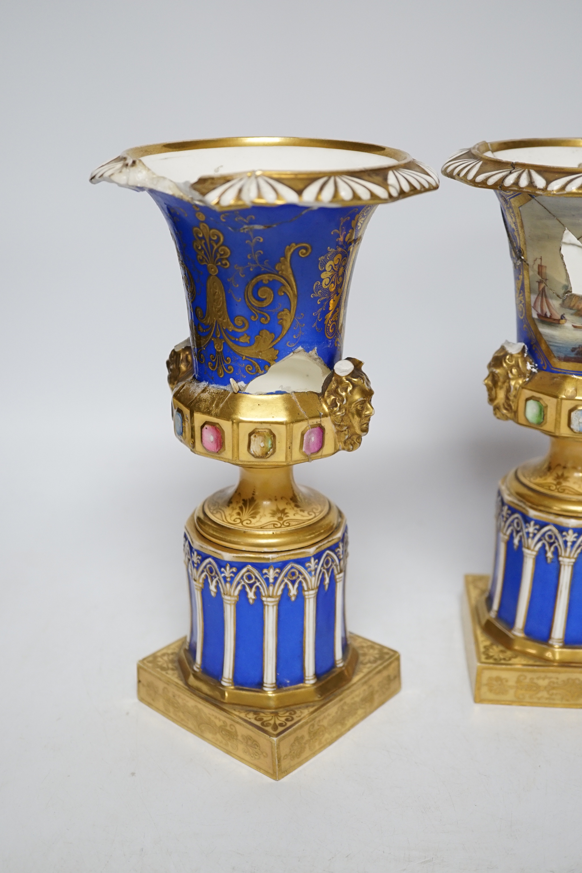 A pair of early 19th century vases - in need of restoration, 25cm